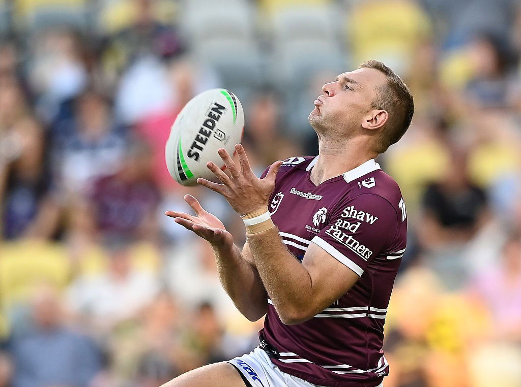 Tom Trbojevic marks a ball.